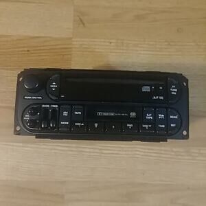 P05064125AD CHRYSLER DODGE JEEP RAM NEW OEM AM FM CD CASSETTE RADIO
